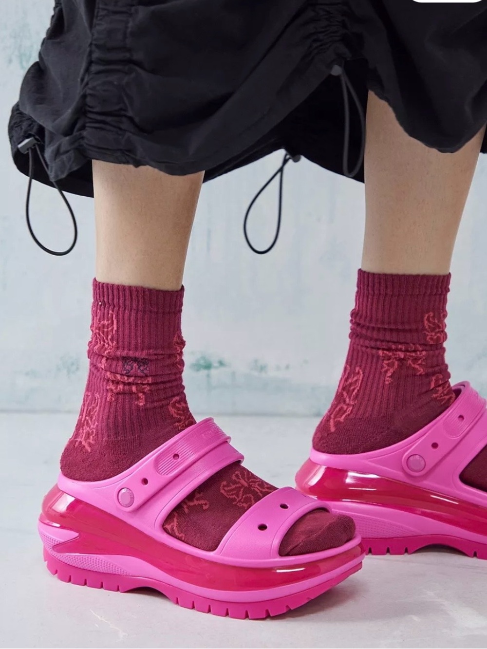 Bright pink Crocs Mega Crush Sandald chunky platform and double strap
